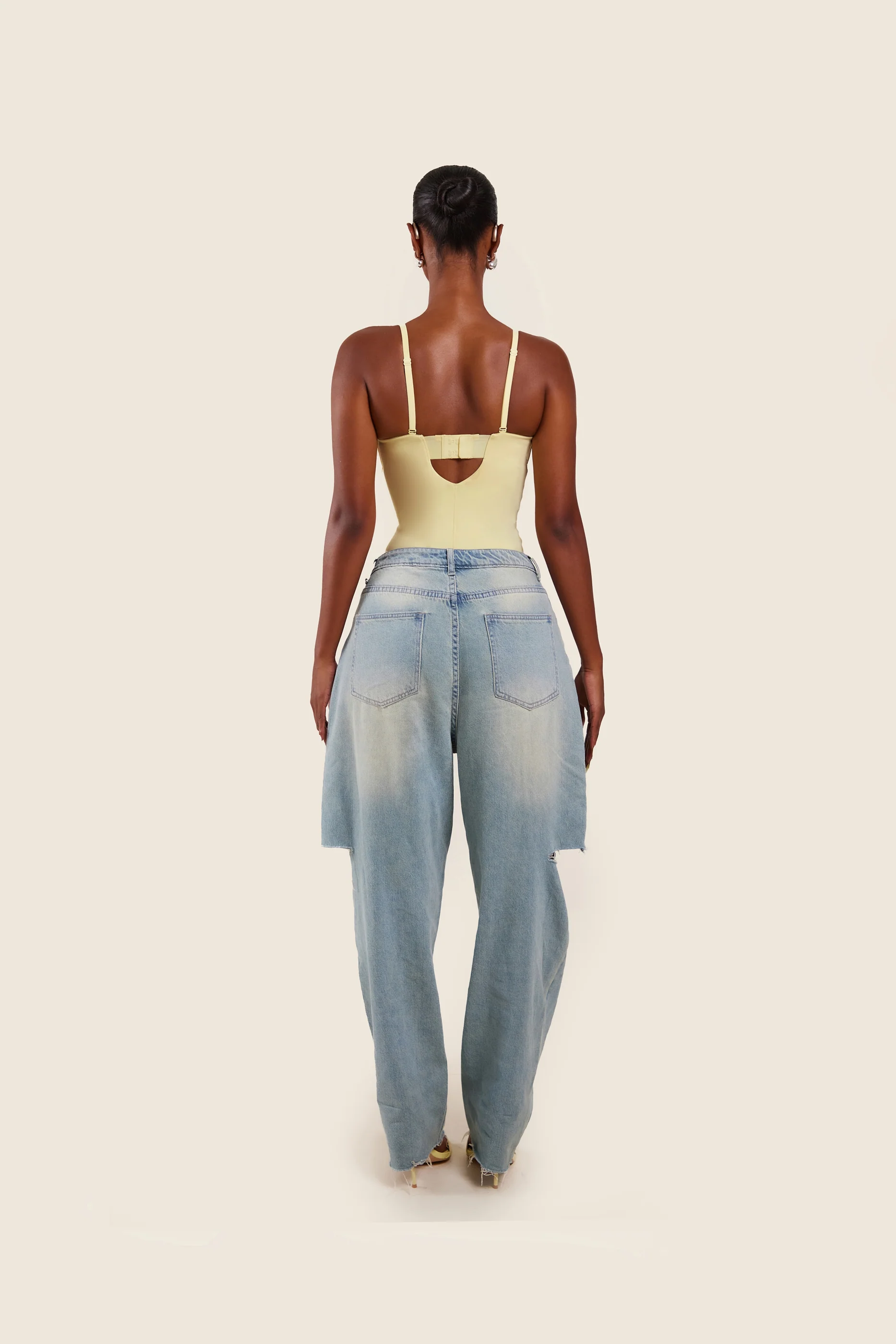The Sculpt Bodysuit in Yellow
