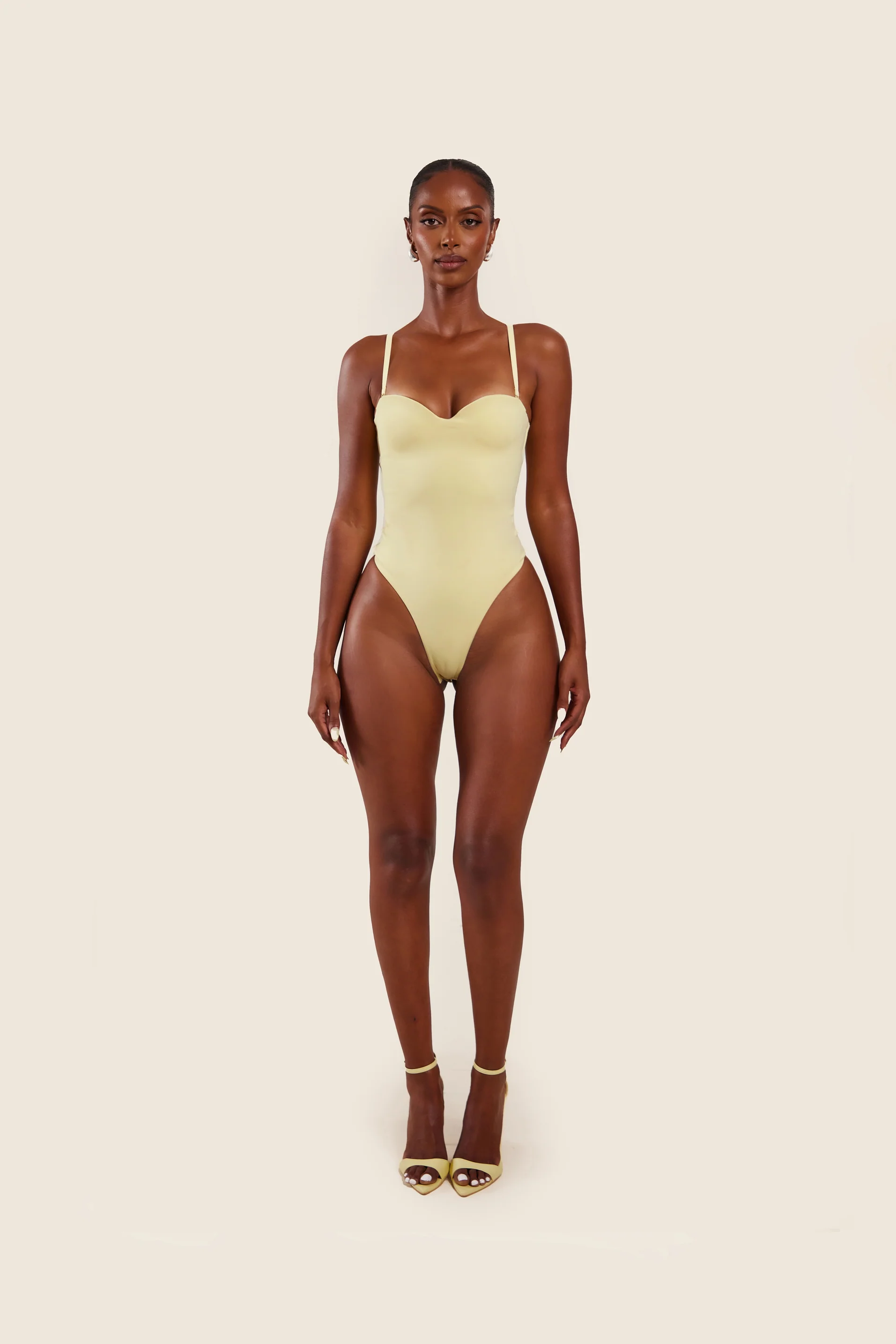 The Sculpt Bodysuit in Yellow