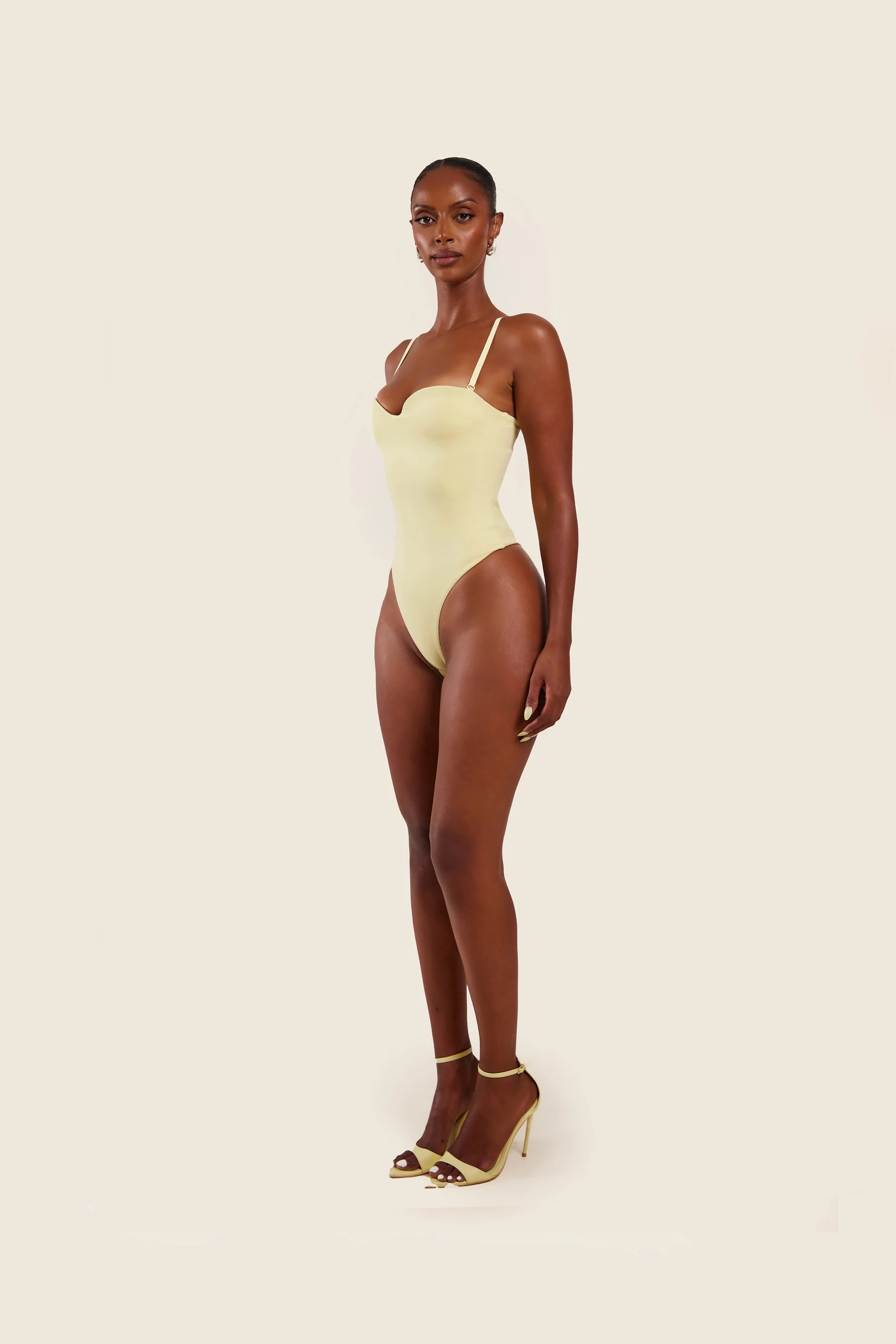 The Sculpt Bodysuit in Yellow