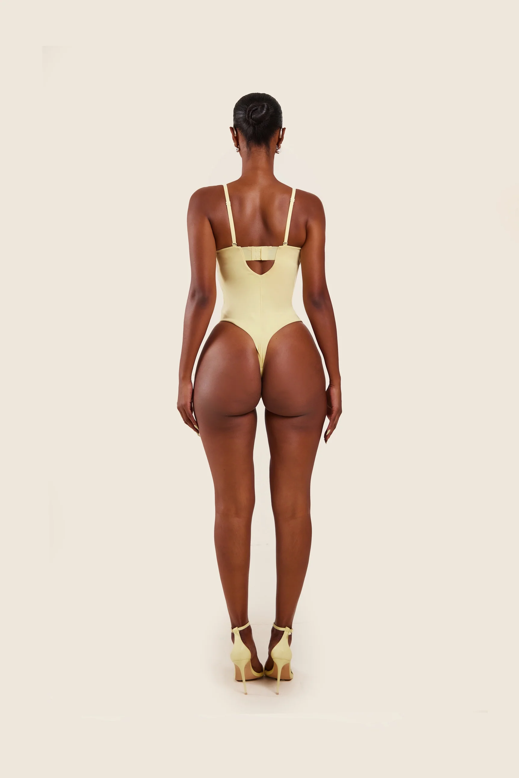 The Sculpt Bodysuit in Yellow