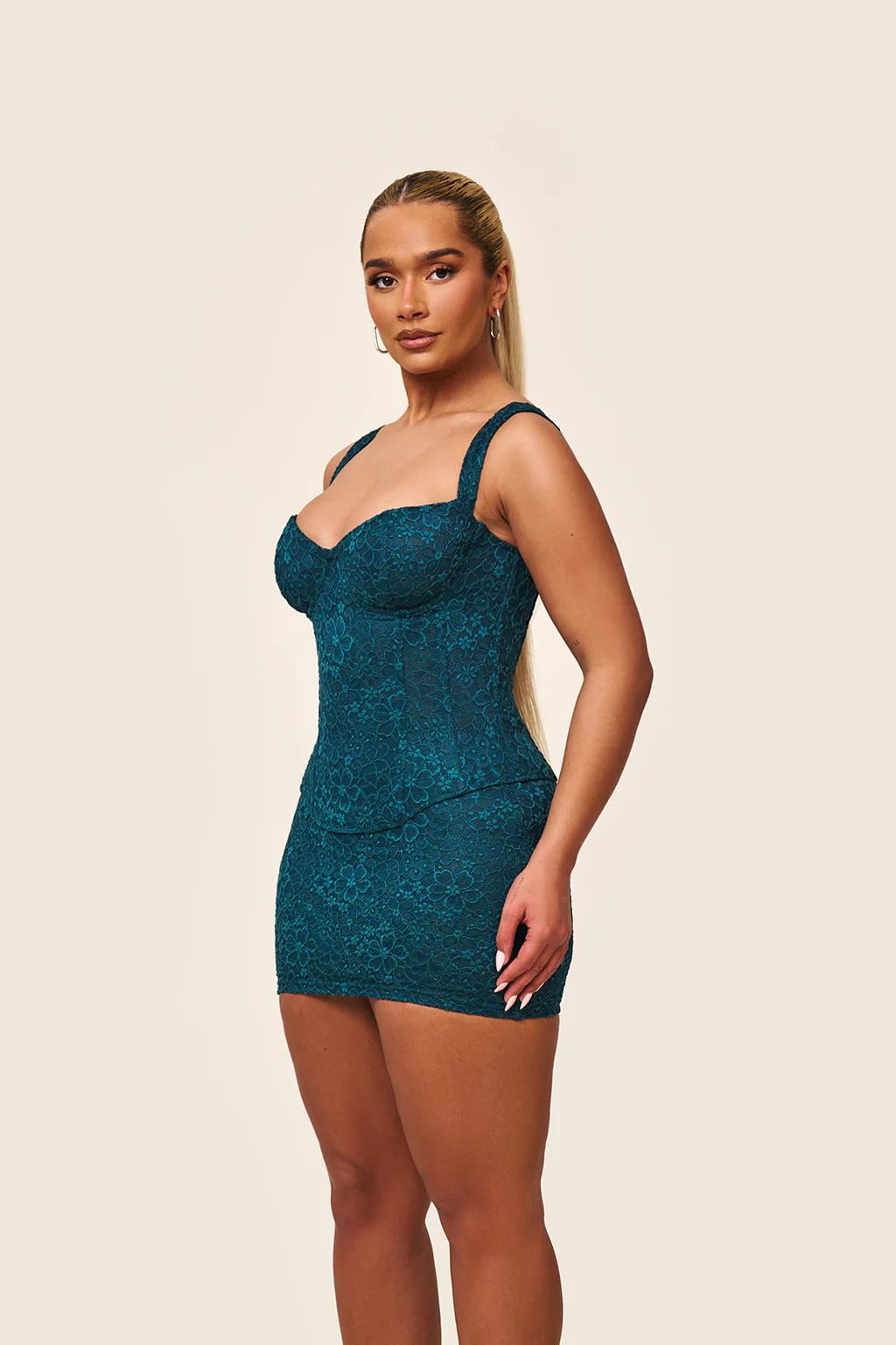 1708-the-cinched-lace-mini-skirt-in-teal-7.webp The Cinched Lace Mini Skirt in Teal
