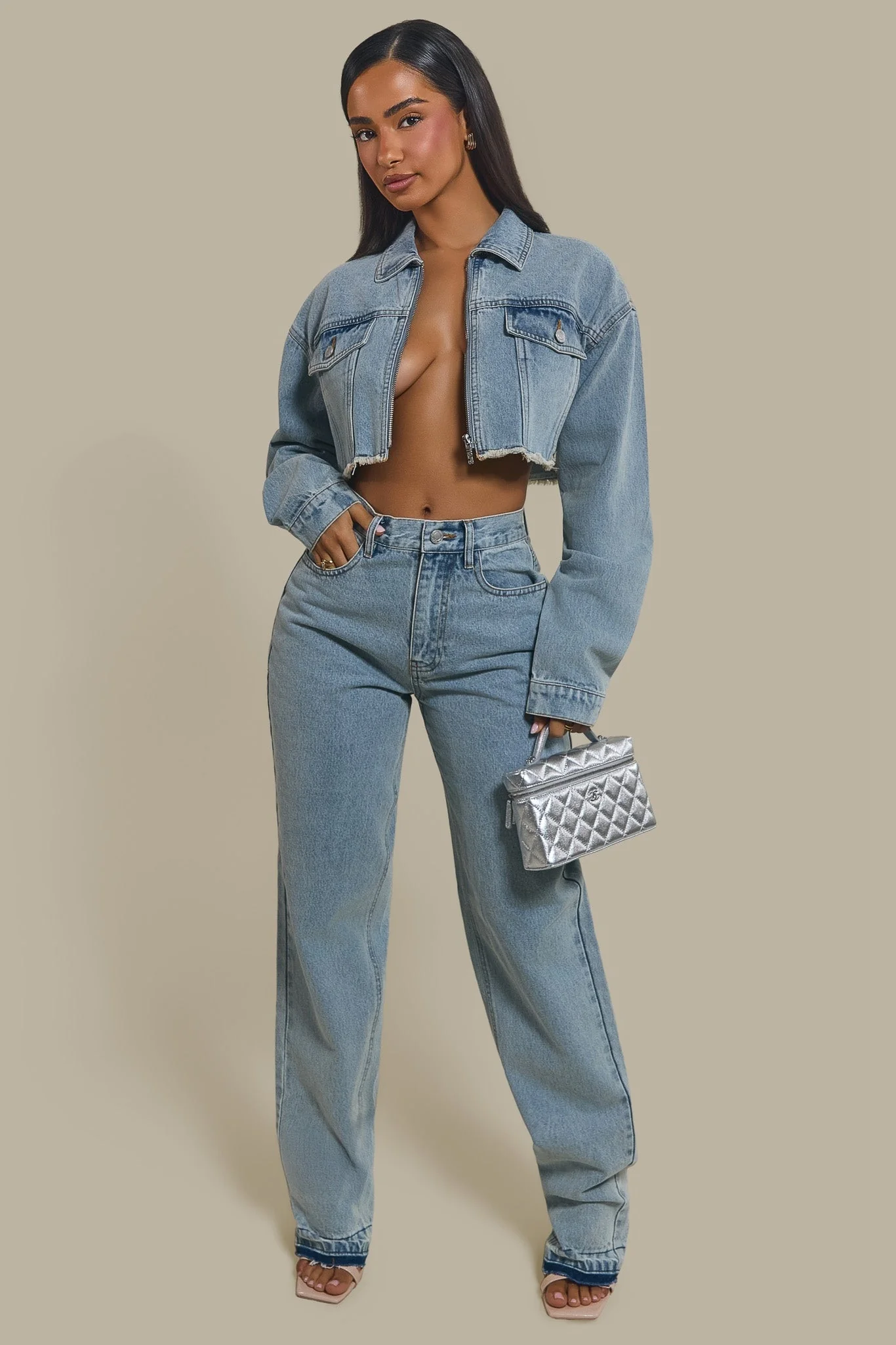 The Kali Mid-Rise Jeans in Light Wash Blue
