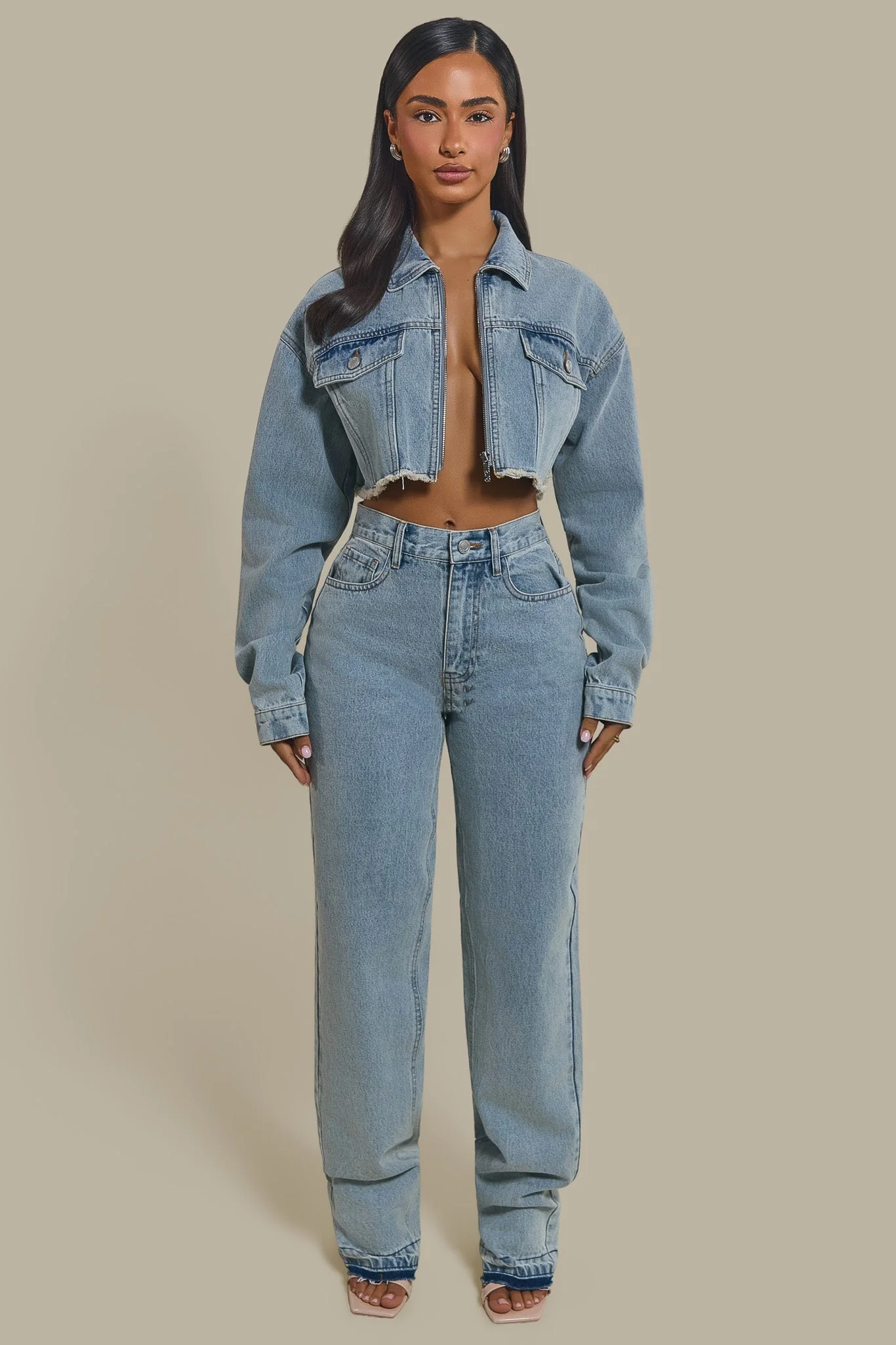 The Kali Mid-Rise Jeans in Light Wash Blue