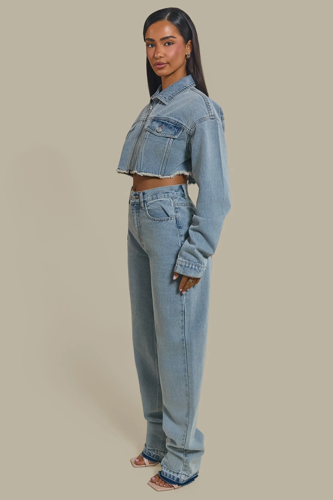 The Kali Mid-Rise Jeans in Light Wash Blue
