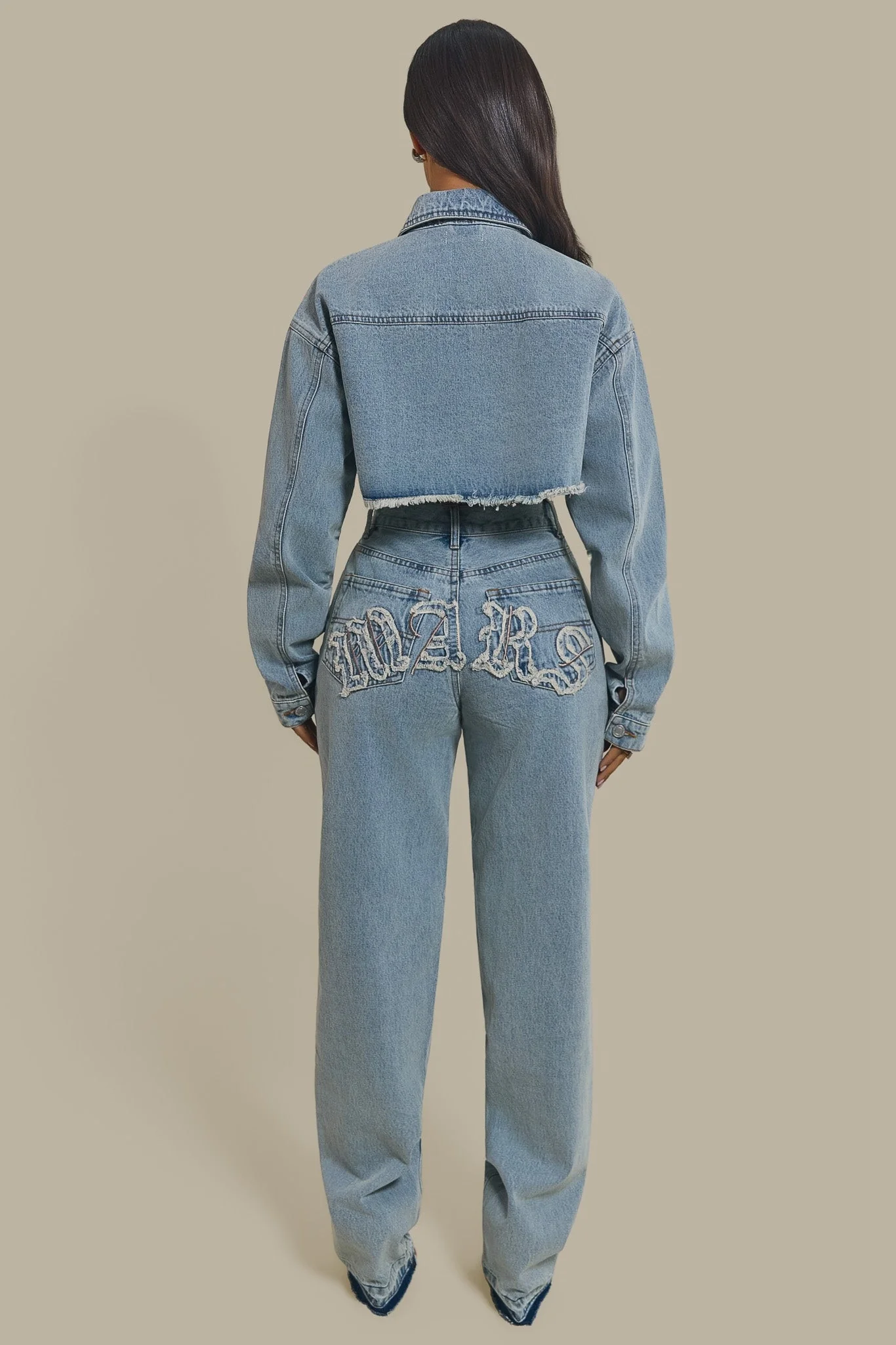 The Kali Mid-Rise Jeans in Light Wash Blue