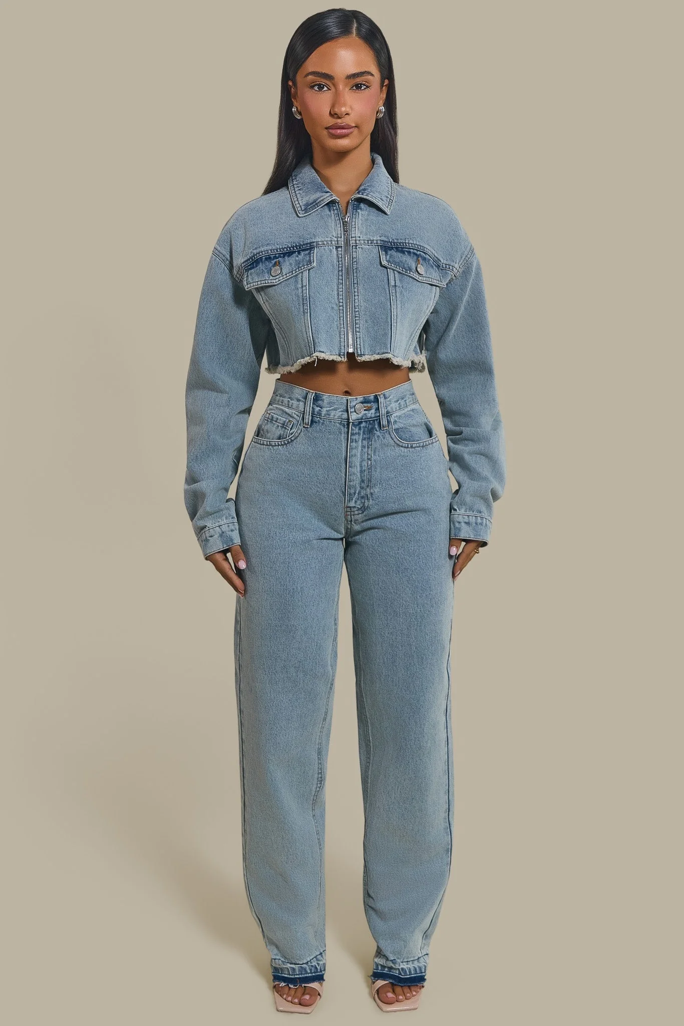The Kali Mid-Rise Jeans in Light Wash Blue