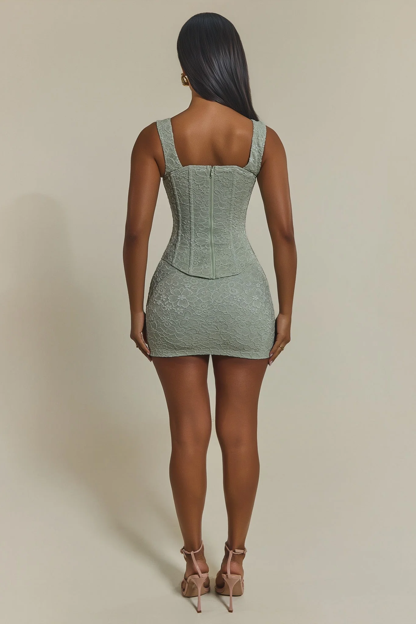3095-the-cinched-lace-corset-mini-skirt-set-in-sage-green-5.webp The Cinched Lace Corset Mini Skirt Set in Sage Green