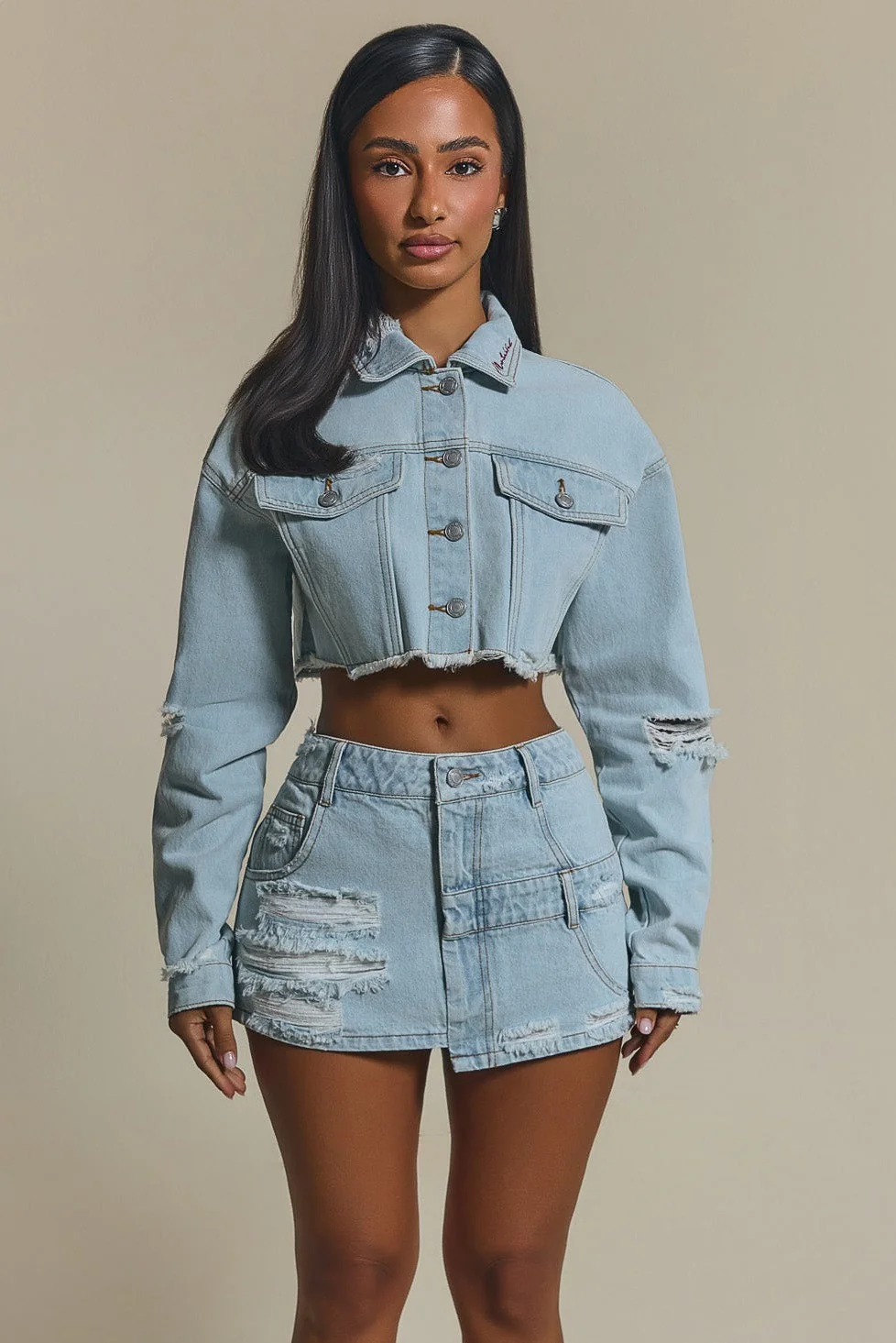 3291-the-esha-cropped-denim-jacket-in-light-wash-blue-1.webp The Esha Cropped Denim Jacket in Light Wash Blue