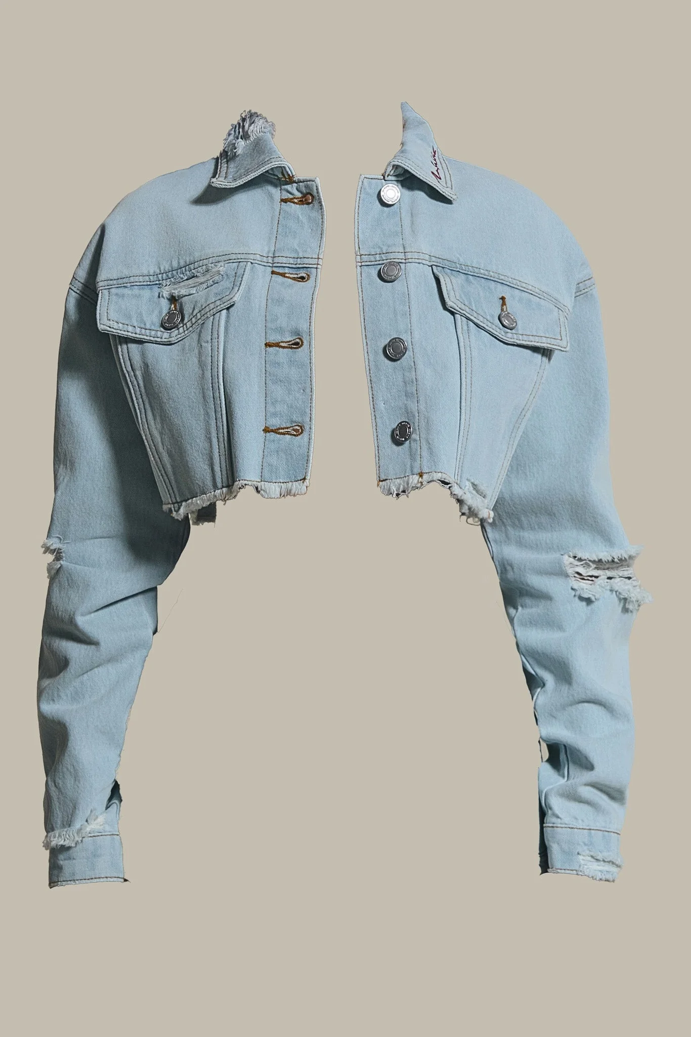 3291-the-esha-cropped-denim-jacket-in-light-wash-blue-5.webp The Esha Cropped Denim Jacket in Light Wash Blue