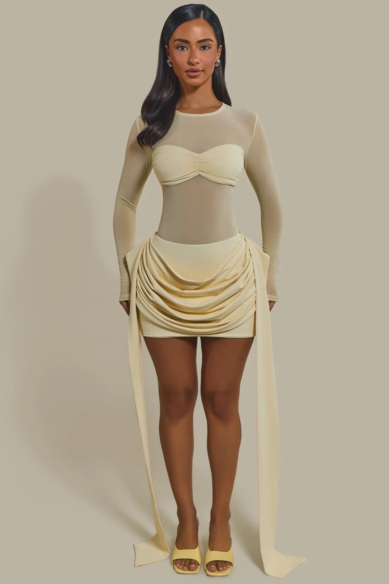 4180-the-yara-long-sleeve-mesh-bodysuit-in-butter-yellow-1.webp The Yara Long Sleeve Mesh Bodysuit in Butter Yellow