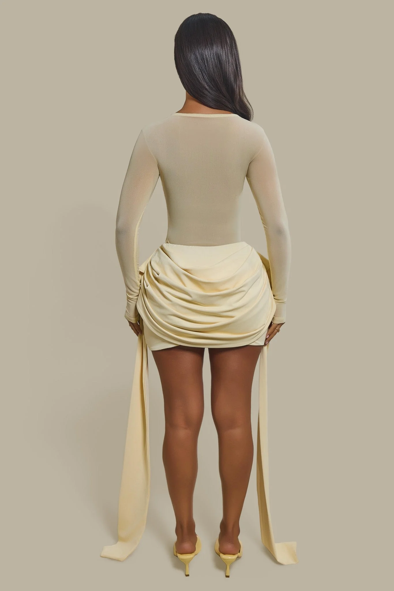 The Yara Long Sleeve Mesh Bodysuit in Butter Yellow