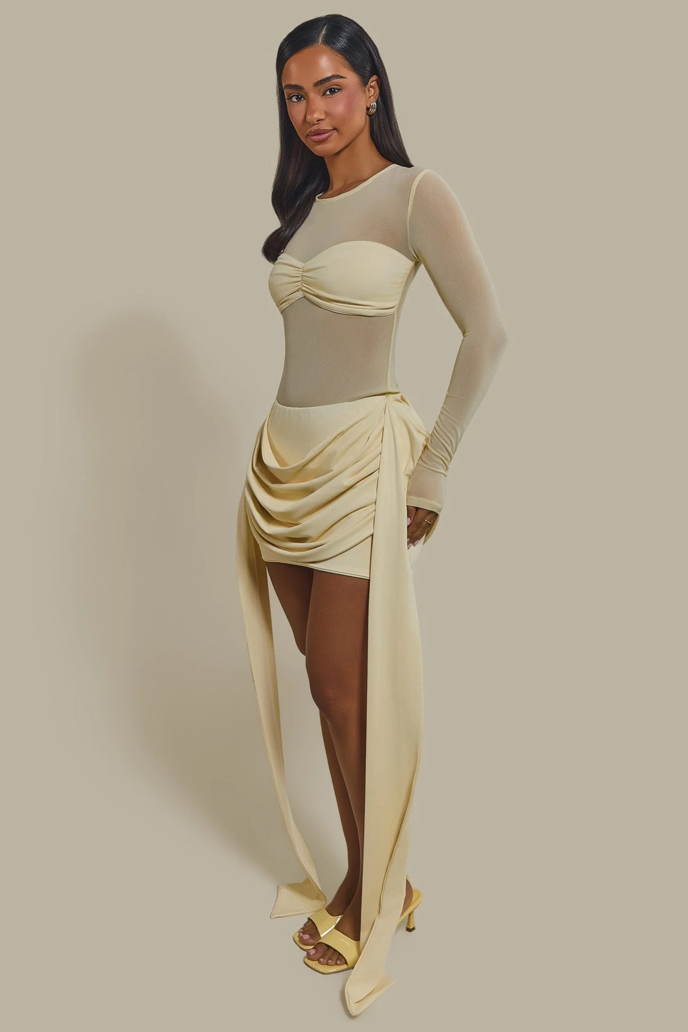 The Yara Long Sleeve Mesh Bodysuit in Butter Yellow