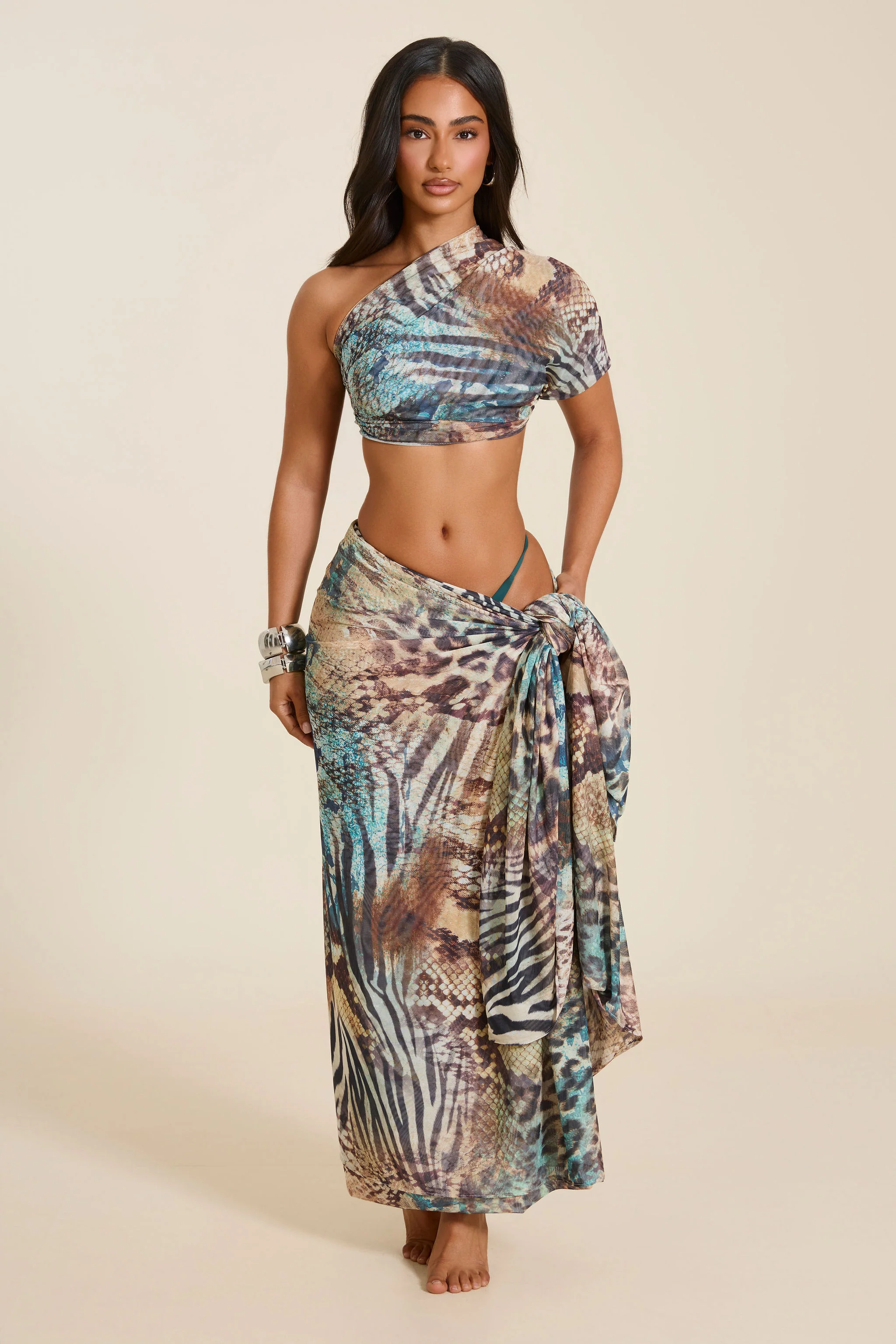 4727-the-gracie-maxi-skirt-and-headscarf-set-in-teal-animal-print-4.webp The Gracie Maxi Skirt and Headscarf Set in Teal Animal Print