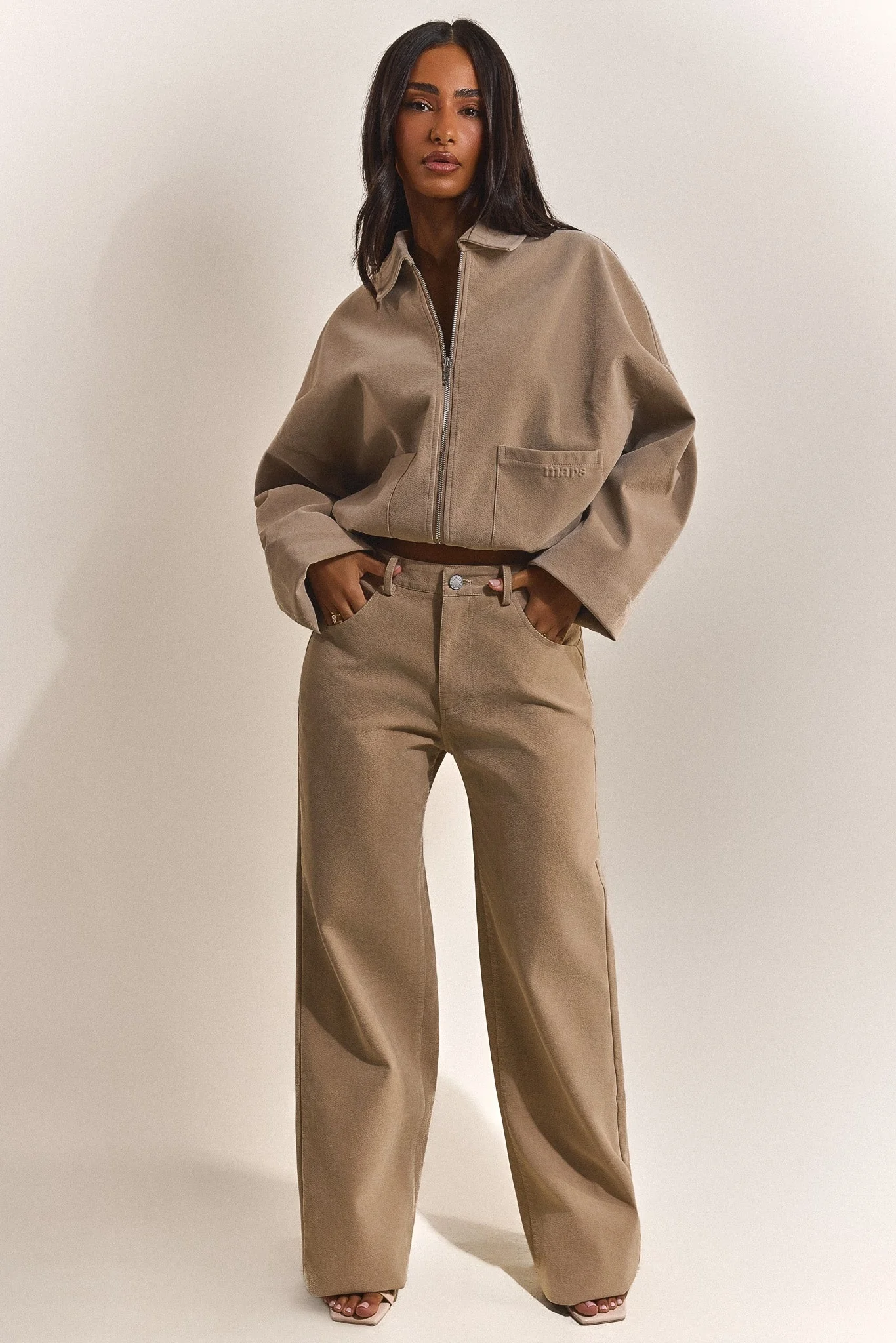 The Isla Faux Suede Straight Leg Trousers in Beige
