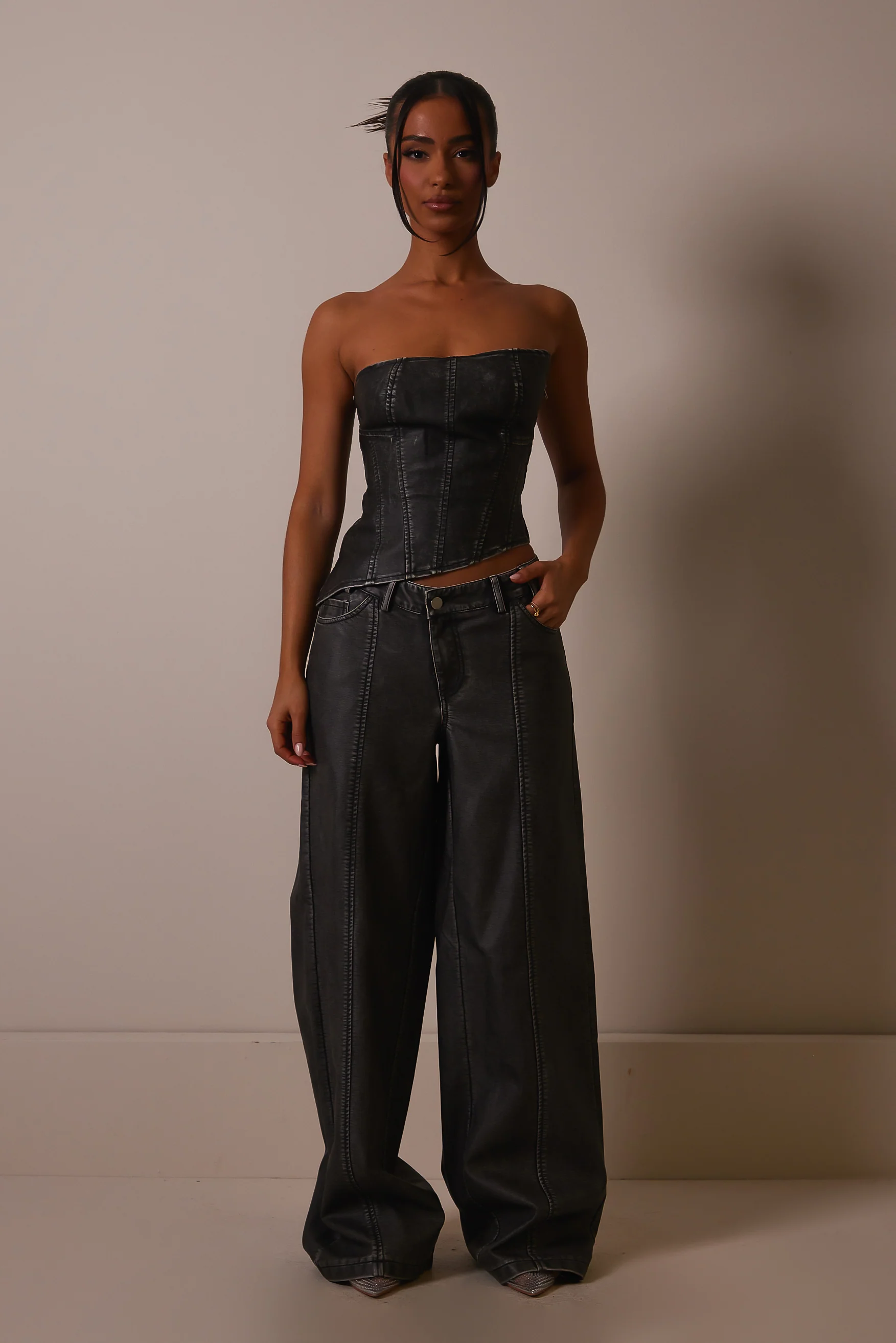 The Distress Wash Asymmetric Leather Corset in Dark Wash