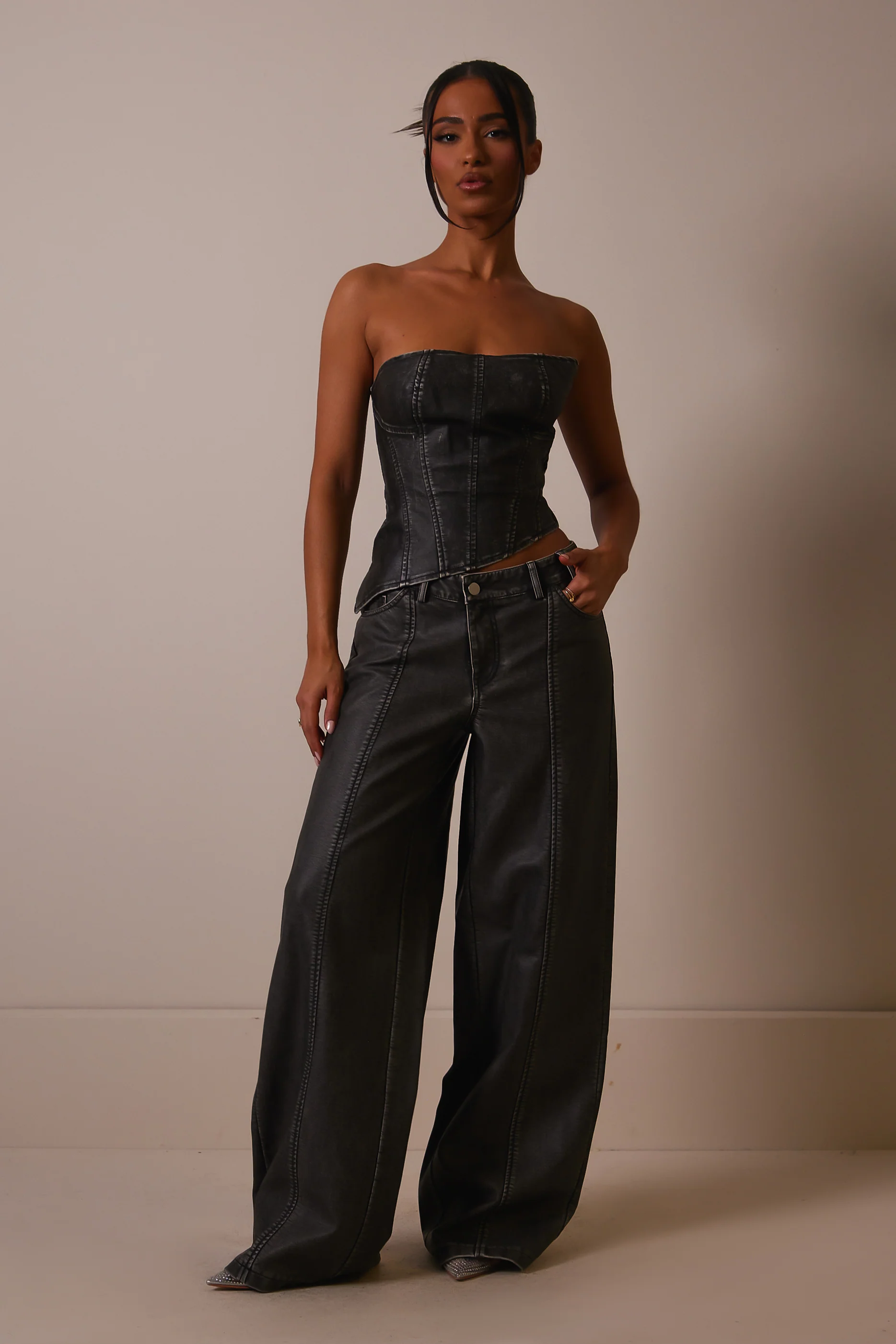 The Distress Wash Asymmetric Leather Corset in Dark Wash