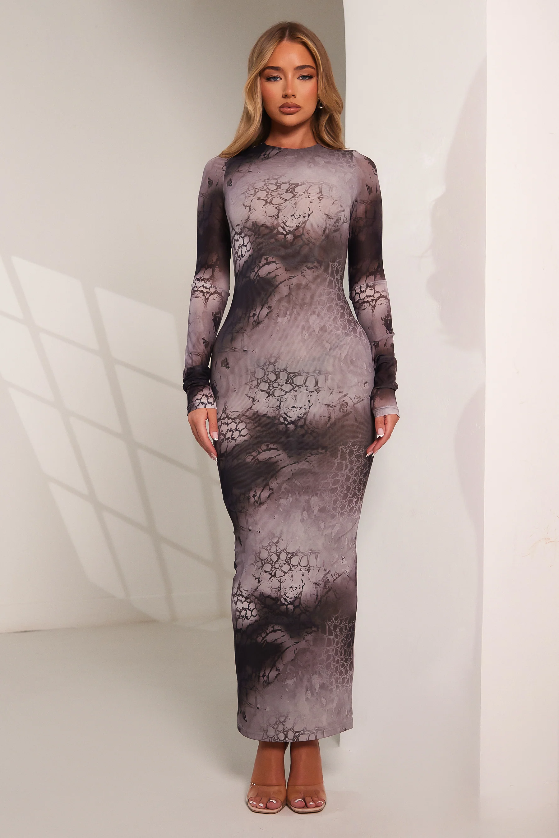 7825-the-zol-midaxi-dress-in-snake-print-1.webp The Zol Midaxi Dress in Snake print
