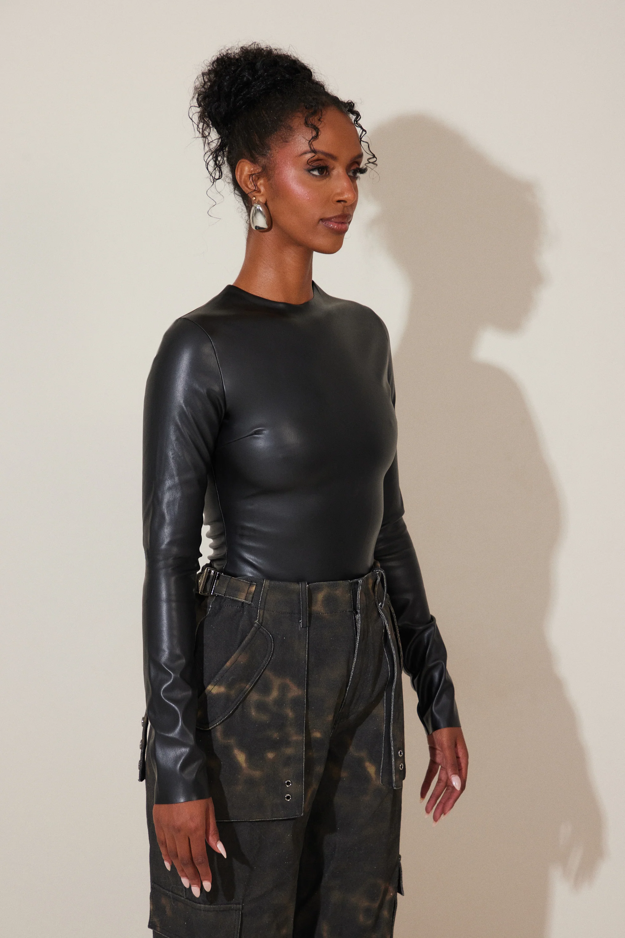 The Rumer Long Sleeved Bodysuit in Black
