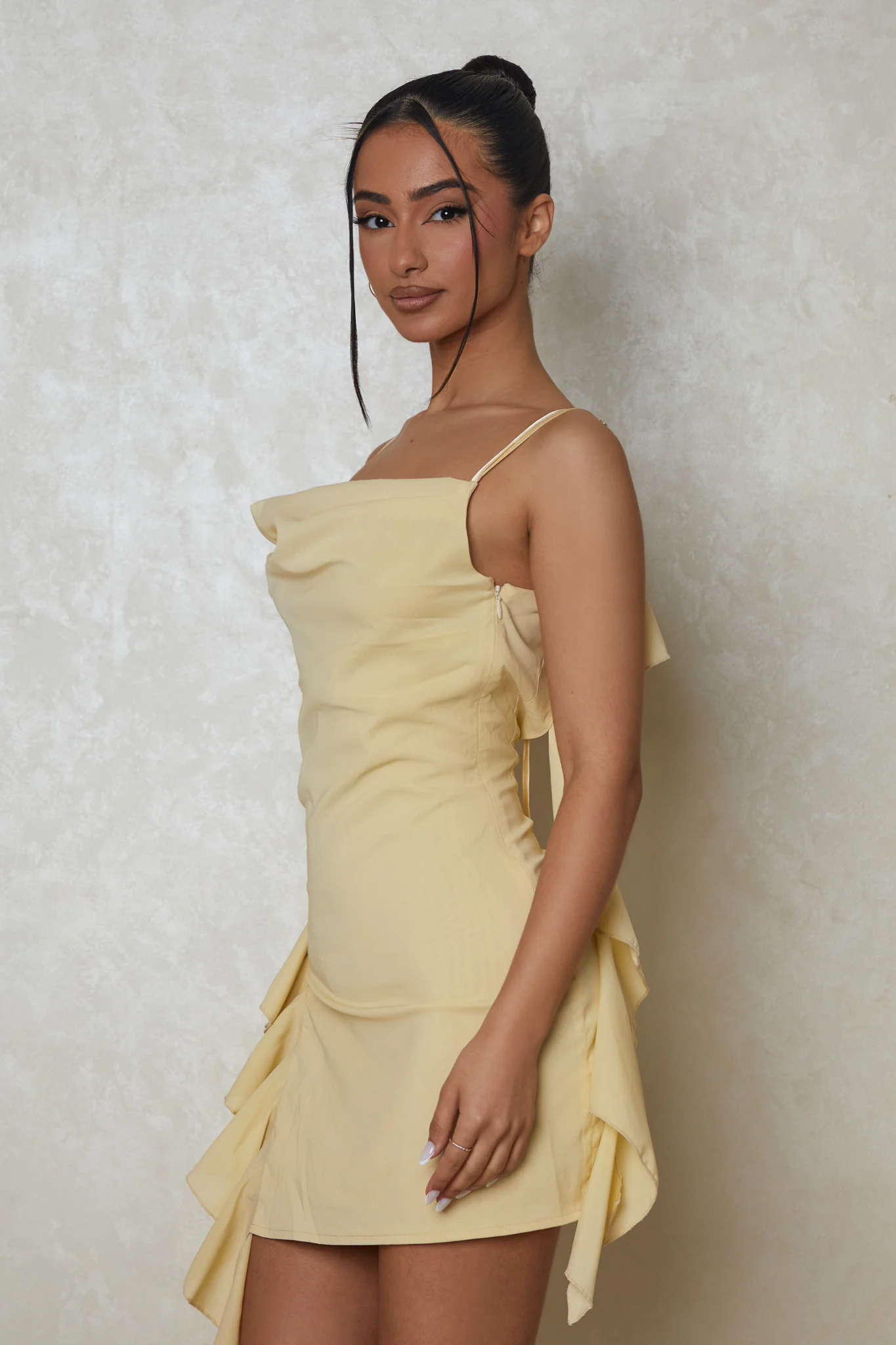 8593-the-cowl-neck-ruffle-mini-dress-in-yellow-2.webp The Cowl Neck Ruffle Mini Dress in Yellow