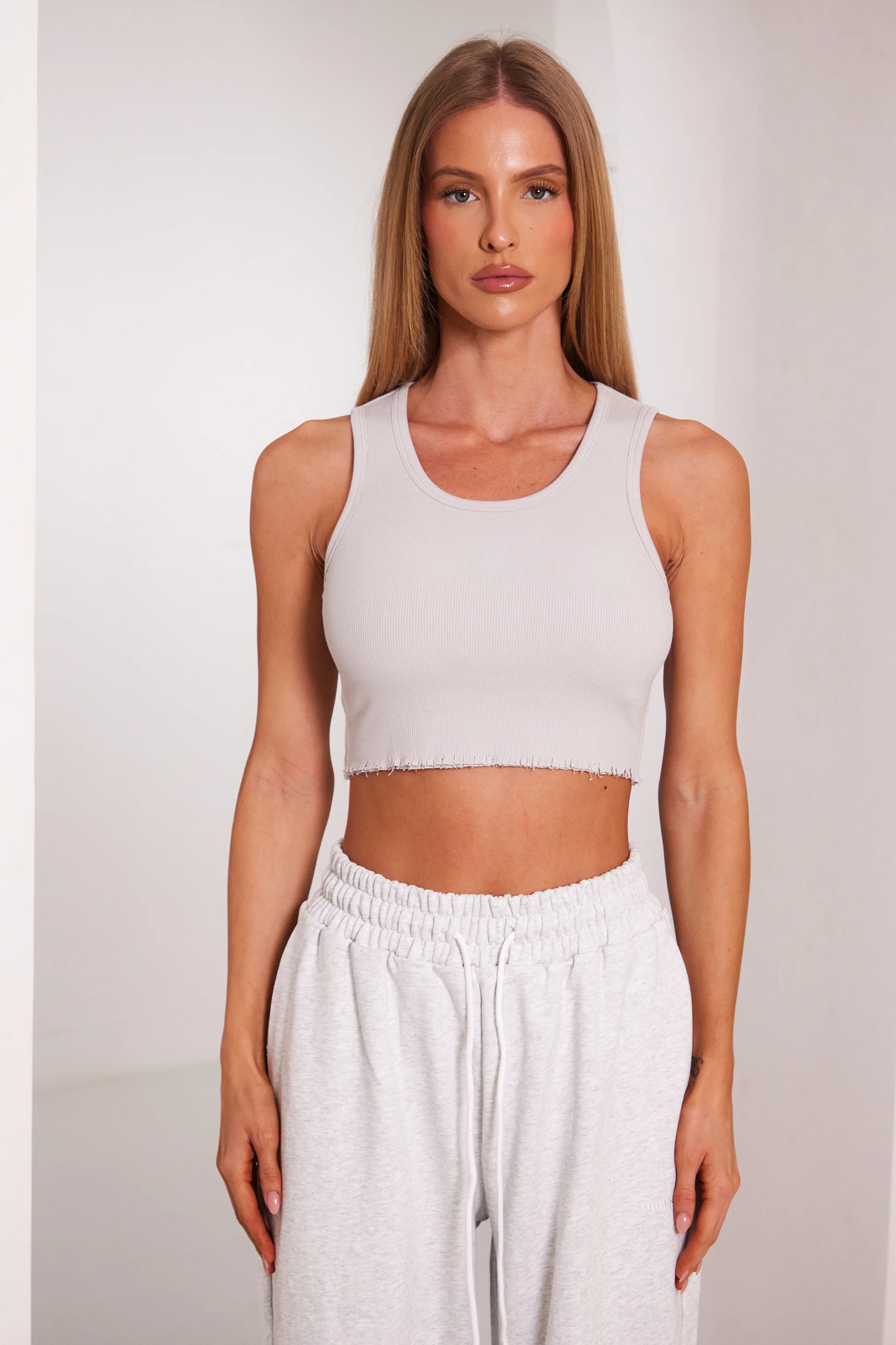 9205-the-distress-hem-vest-in-grey-6.webp The Distress Hem Vest in Grey