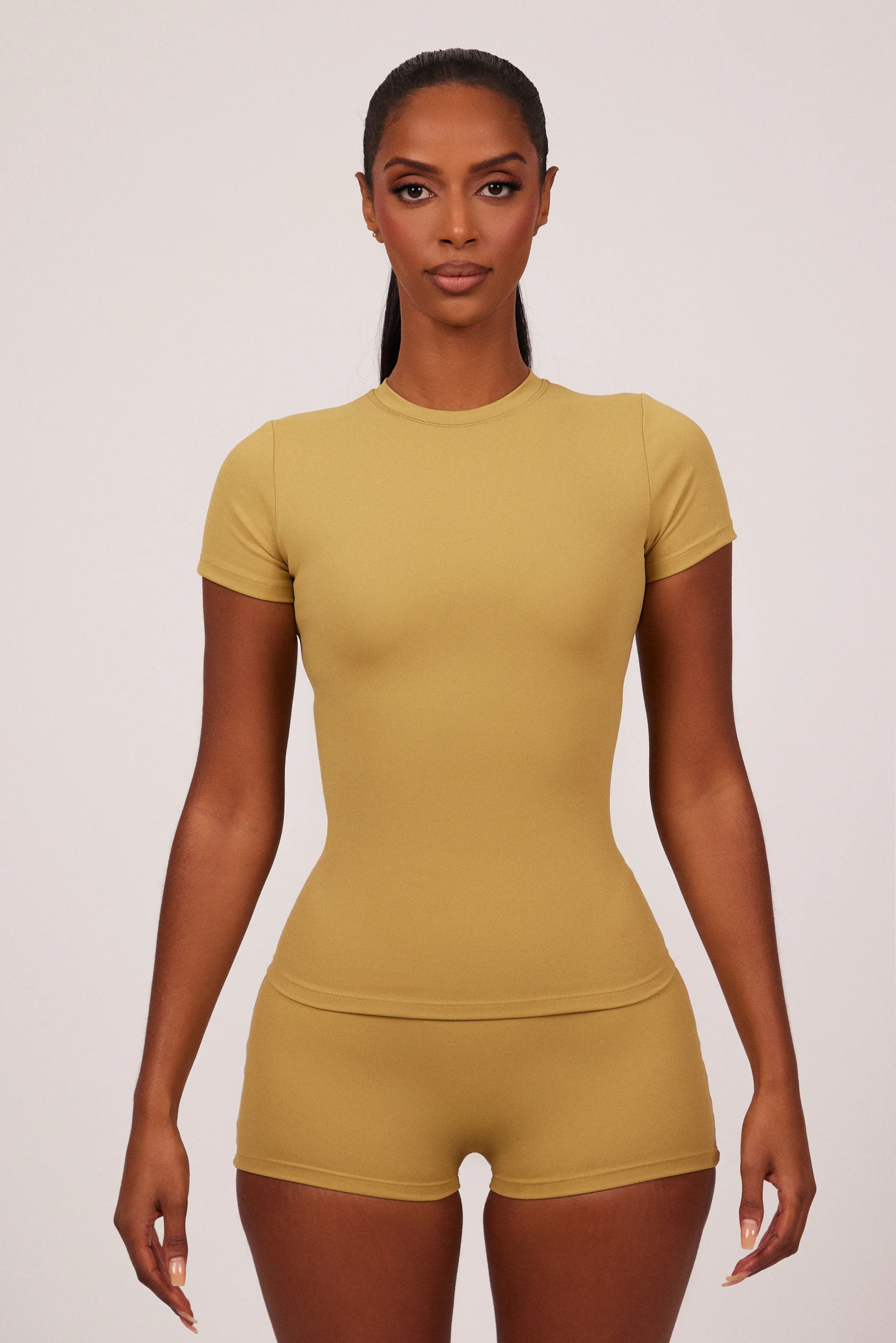 9470-the-sculpt-short-sleeve-tee-in-khaki-1.webp The Sculpt Short Sleeve Tee in Khaki